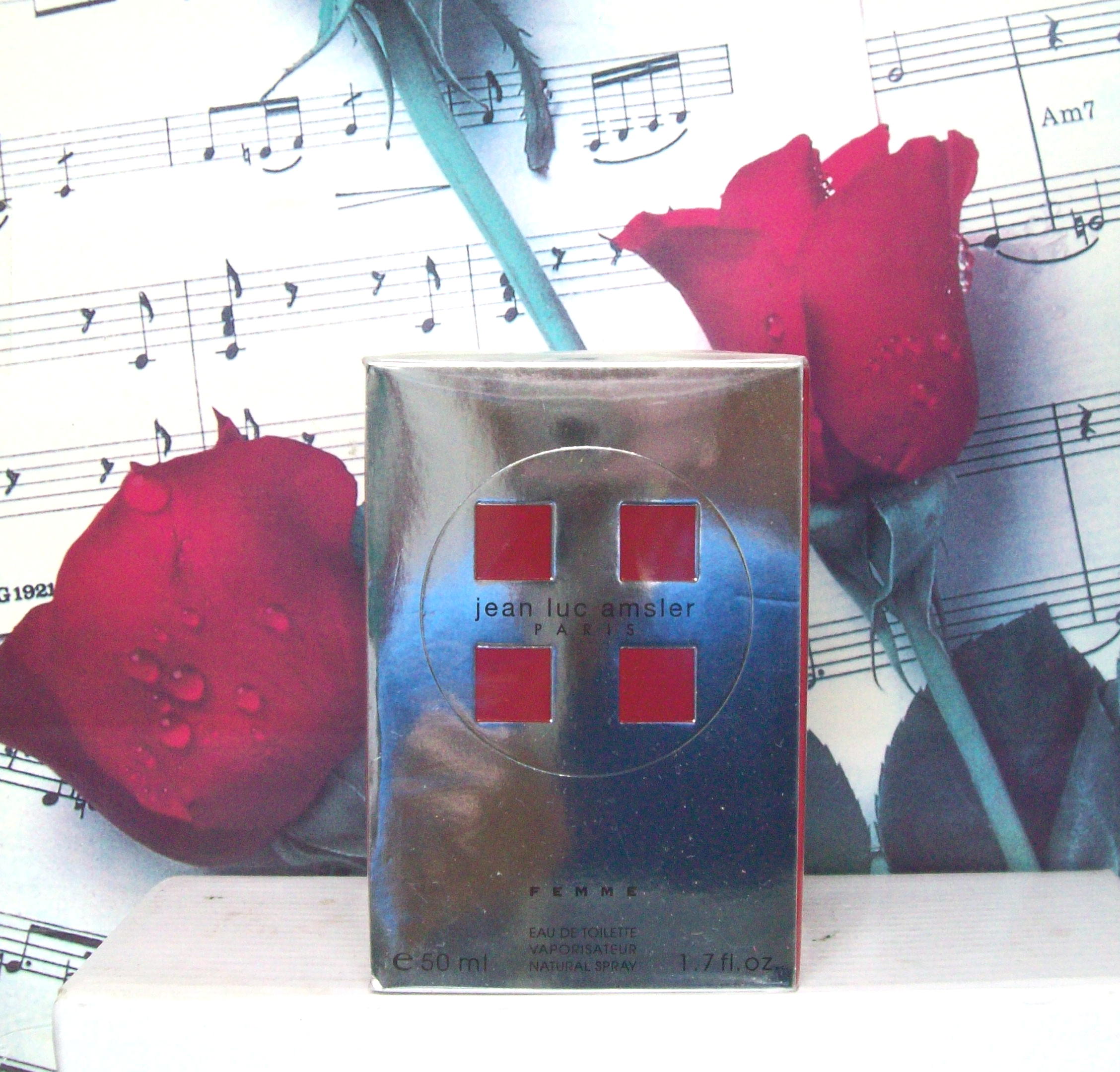 Jean Luc Amsler Femme 1.7 OZ EDT perfume bottle