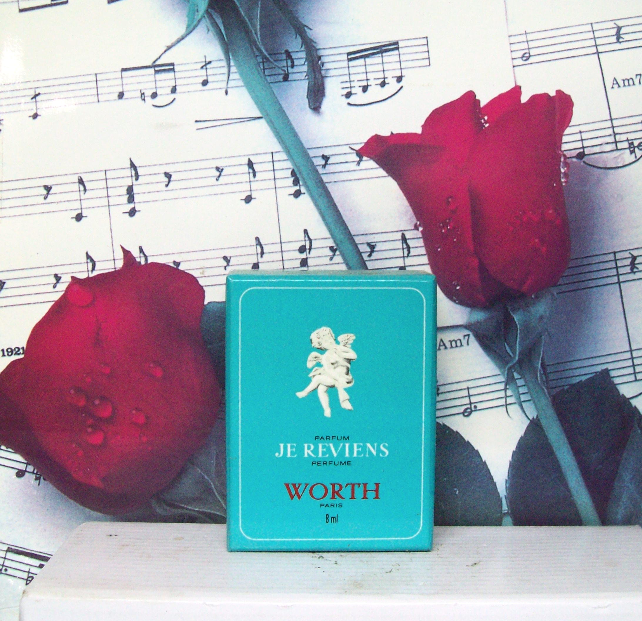 Je Reviens Parfum by Worth 0.25 OZ in box